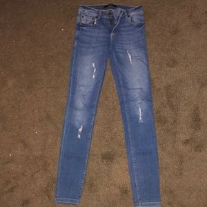 Light ripped skinny jeans